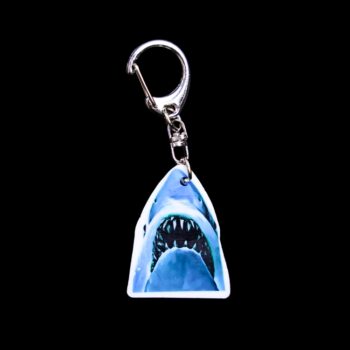 Jaws Bag Tag. This bag tag is made with acrylic and heat pressed. Comes with lobster clasp topper that easily hooks to a bag or to zippers for fun display and swivels. White backside.