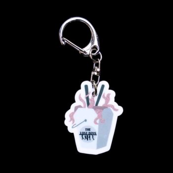 Lost Boys Noodles Bag Tag. This bag tag is made with acrylic and heat pressed. Comes with lobster clasp topper that easily hooks to a bag or to zippers for fun display and swivels. White backside.