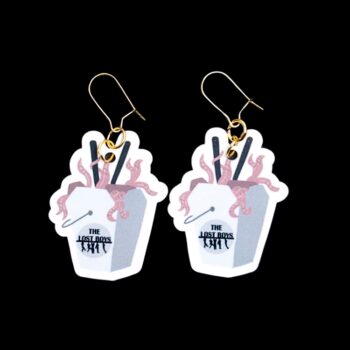 Lost Boys Noodle Earrings. These earrings are made with acrylic and hand heat pressed. Comes with 18k plated gold hooks that is nickel free. Easily put loop through ear and hook back so the earring doesn’t fall out.