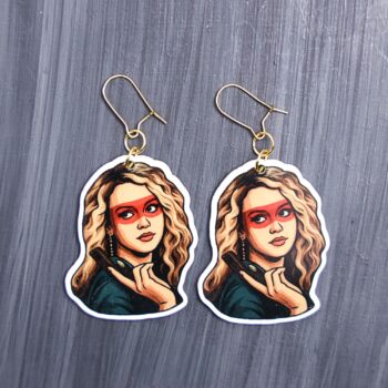 80's Killer Chick Earrings. These earrings are made with acrylic and hand heat pressed. Comes with 18k plated gold hooks that is nickel free. Easily put loop through ear and hook back so the earring doesn’t fall out.