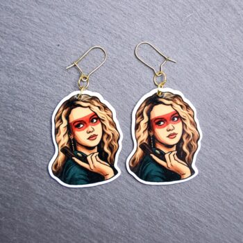 80's Killer Chick Earrings. These earrings are made with acrylic and hand heat pressed. Comes with 18k plated gold hooks that is nickel free. Easily put loop through ear and hook back so the earring doesn’t fall out.