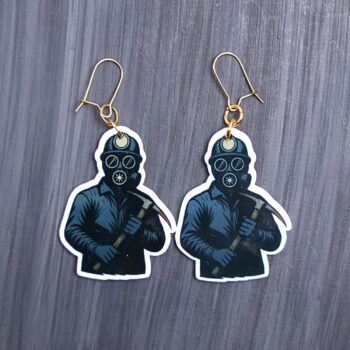 Bloody Miner Earrings. These earrings are made with acrylic and hand heat pressed. Comes with 18k plated gold hooks that is nickel free. Easily put loop through ear and hook back so the earring doesn’t fall out.