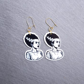 Bride Earrings. These earrings are made with acrylic and hand heat pressed. Comes with 18k plated gold hooks that is nickel free. Easily put loop through ear and hook back so the earring doesn’t fall out.