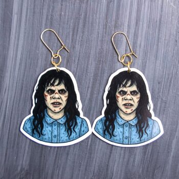 Demon Girl Earrings. These earrings are made with acrylic and hand heat pressed. Comes with 18k plated gold hooks that is nickel free. Easily put loop through ear and hook back so the earring doesn’t fall out.