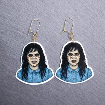 Demon Girl Earrings. These earrings are made with acrylic and hand heat pressed. Comes with 18k plated gold hooks that is nickel free. Easily put loop through ear and hook back so the earring doesn’t fall out.