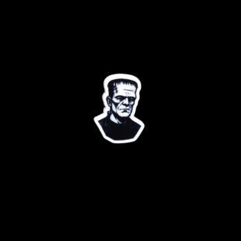 Frank Pin. These pin are made with thick acrylic and hand heat pressed. Comes with metal pin with black rubber stopper.