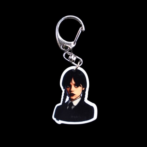 Monday's Child Bag Tag. This bag tag is made with acrylic and heat pressed. Comes with lobster clasp topper that easily hooks to a bag, zippers, and lanyards for fun display and swivels. White backside.