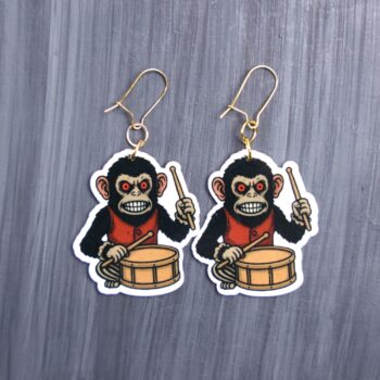 Monkey Earrings. These earrings are made with acrylic and hand heat pressed. Comes with 18k plated gold hooks that is nickel free. Easily put loop through ear and hook back so the earring doesn’t fall out.
