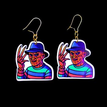 Neon Dream Demon Earrings. These earrings are made with acrylic and hand heat pressed. Comes with 18k plated gold hooks that is nickel free. Easily put loop through ear and hook back so the earring doesn’t fall out.