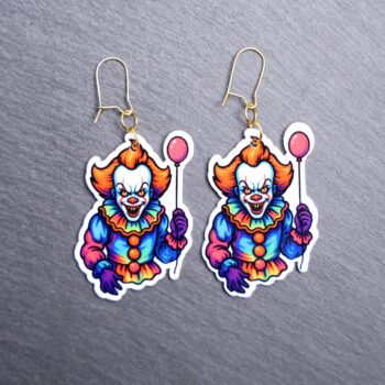 Neon Dancing Clown Earrings. These earrings are made with acrylic and hand heat pressed. Comes with 18k plated gold hooks that is nickel free. Easily put loop through ear and hook back so the earring doesn’t fall out.