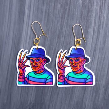 Neon Dream Demon Earrings. These earrings are made with acrylic and hand heat pressed. Comes with 18k plated gold hooks that is nickel free. Easily put loop through ear and hook back so the earring doesn’t fall out.