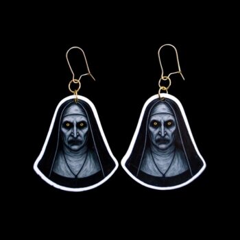 Nun Earrings. These earrings are made with acrylic and hand heat pressed. Comes with 18k plated gold hooks that is nickel free. Easily put loop through ear and hook back so the earring doesn’t fall out.