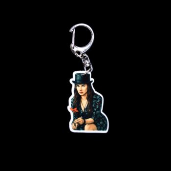She's The Hat Bag Tag. This bag tag is made with acrylic and heat pressed. Comes with lobster clasp topper that easily hooks to a bag, zippers, and lanyards for fun display and swivels. White backside.