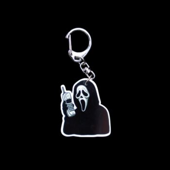 The Voice Cordless Phone Bag Tag. This bag tag is made with acrylic and heat pressed. Comes with lobster clasp topper that easily hooks to a bag, zippers, and lanyards for fun display and swivels. White backside.