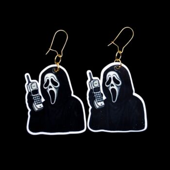 The Voice Cordless Phone Earrings. These earrings are made with acrylic and hand heat pressed. Comes with 18k plated gold hooks that is nickel free. Easily put loop through ear and hook back so the earring doesn’t fall out.