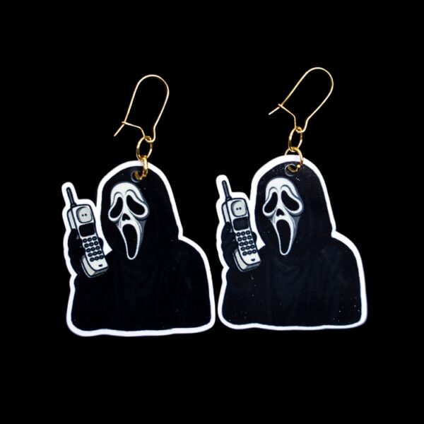 The Voice Cordless Phone Earrings. These earrings are made with acrylic and hand heat pressed. Comes with 18k plated gold hooks that is nickel free. Easily put loop through ear and hook back so the earring doesn’t fall out.