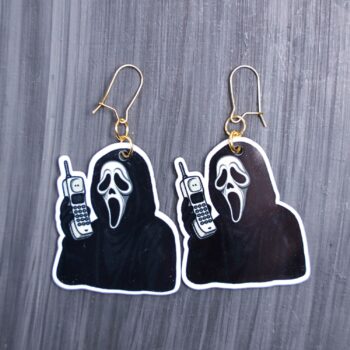 The Voice Cordless Phone Earrings. These earrings are made with acrylic and hand heat pressed. Comes with 18k plated gold hooks that is nickel free. Easily put loop through ear and hook back so the earring doesn’t fall out.