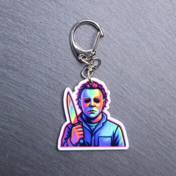 Neon The Shape Bag Tag. This bag tag is made with acrylic and heat pressed. Comes with lobster clasp topper that easily hooks to a bag, zippers, and lanyards for fun display and swivels. White backside.