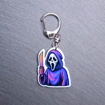 Neon The Voice Bag Tag. This bag tag is made with acrylic and heat pressed. Comes with lobster clasp topper that easily hooks to a bag, zippers, and lanyards for fun display and swivels. White backside.