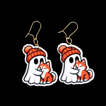 Ghost Beanie Red Husky Earrings. These earrings are made with acrylic and hand heat pressed. Comes with 18k plated gold hooks that is nickel free. Easily put loop through ear and hook back so the earring doesn’t fall out.