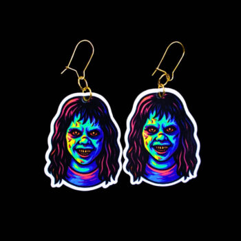 Neon Demon Girl Earrings. These earrings are made with acrylic and hand heat pressed. Comes with 18k plated gold hooks that is nickel free. Easily put loop through ear and hook back so the earring doesn’t fall out.