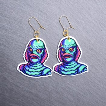 Neon Creature Earrings. These earrings are made with acrylic and hand heat pressed. Comes with 18k plated gold hooks that is nickel free. Easily put loop through ear and hook back so the earring doesn’t fall out.