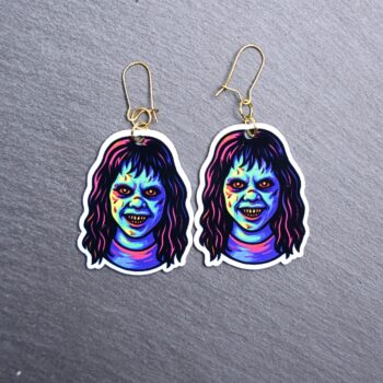 Neon Demon Girl Earrings. These earrings are made with acrylic and hand heat pressed. Comes with 18k plated gold hooks that is nickel free. Easily put loop through ear and hook back so the earring doesn’t fall out.