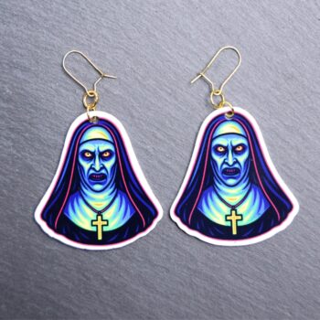 Neon Nun Earrings. These earrings are made with acrylic and hand heat pressed. Comes with 18k plated gold hooks that is nickel free. Easily put loop through ear and hook back so the earring doesn’t fall out.