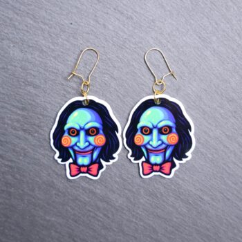 Neon Puppet Earrings. These earrings are made with acrylic and hand heat pressed. Comes with 18k plated gold hooks that is nickel free. Easily put loop through ear and hook back so the earring doesn’t fall out.