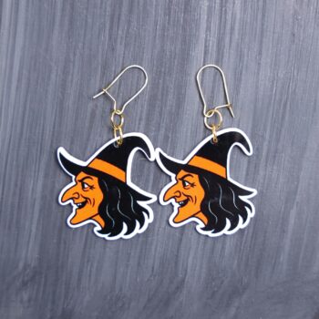 Vintage Witch Earrings. These earrings are made with acrylic and hand heat pressed. Comes with 18k plated gold hooks that is nickel free. Easily put loop through ear and hook back so the earring doesn’t fall out.