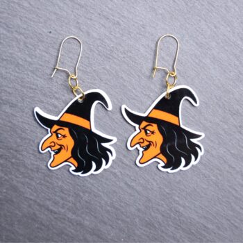 Vintage Witch Earrings. These earrings are made with acrylic and hand heat pressed. Comes with 18k plated gold hooks that is nickel free. Easily put loop through ear and hook back so the earring doesn’t fall out.