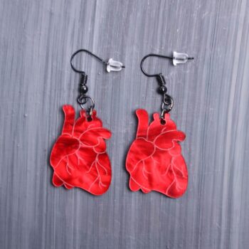 Anatomical Heart Earrings. These earrings are made with acrylic. Comes with black hooks that is nickel free.