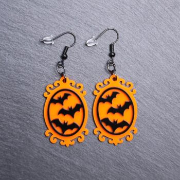 Bat Frame Earrings. These earrings are made with orange and black acrylic. Comes with black hooks that is nickel free.