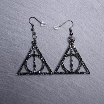 Deathly Hallows Earrings. These earrings are made with glitter black acrylic. Comes with black hooks that is nickel free.
