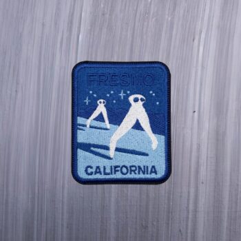 Fresno California Night Crawler Patch with white night crawlers and blue background. Beautifully embroidered design with an Velcro backing with flat back to easily glue with e6000 glue to your favorite bag or article of clothing.
