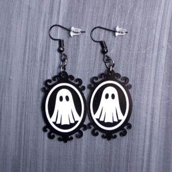 Ghost Frame Earrings. These earrings are made with white  and black acrylic. Comes with black hooks that is nickel free.