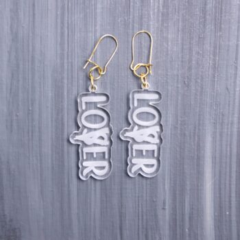 Loser Lover Clear Earrings. These earrings are made with clear acrylic. Comes with gold hooks that is nickel free.