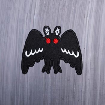 Mothman Big Wings Patch in white and black with red eyes. Beautifully embroidered design with an adhesive for easy application to your favorite bag or article of clothing.