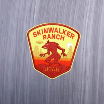 Utah Skinwalker Patch with yellow and orange with a desert backdrop. Beautifully embroidered design with an adhesive for easy application to your favorite bag or article of clothing.