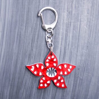 Demogorgon Bag Tag. Red pearl and white acrylic designed charm with a swivel lobster snap hook in high quality metal alloy.