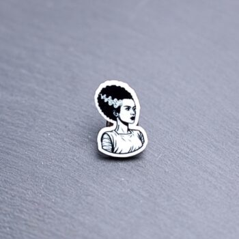 Bride Acrylic Pin. These acrylic pins are made with cast acrylic. These pins are colorful, with a black pin back.