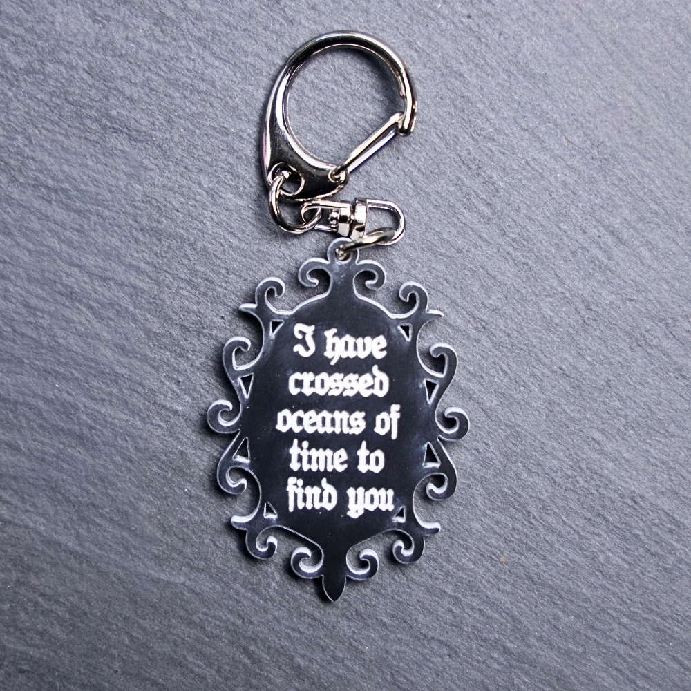 Crossed Oceans of Time Bag Tag. This bag tag is made with engraved acrylic. Comes with lobster clasp topper that easily hooks to a bag, zippers,