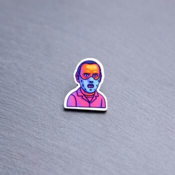 Neon Chesapeake Killer Acrylic Pin. These acrylic pins are made with cast acrylic. These pins are colorful, with a black pin back.