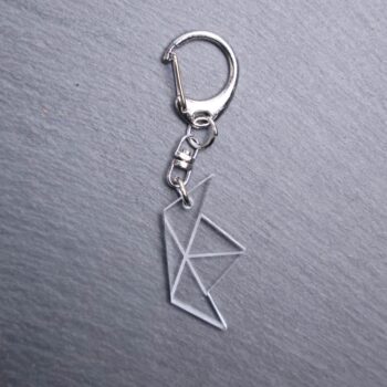 Paper Boat Bag Tag. This bag tag is made with engraved acrylic. Comes with lobster clasp topper that easily hooks to a bag, zippers, and lanyards for fun display and swivels.