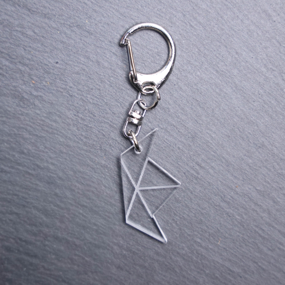 Paper Boat Bag Tag. This bag tag is made with engraved acrylic. Comes with lobster clasp topper that easily hooks to a bag, zippers, and lanyards for fun display and swivels.