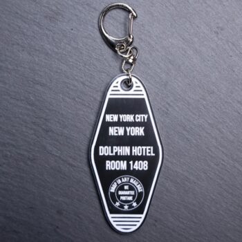 1408 Hotel Bag Tag. This bag tag is made with engraved acrylic. Comes with lobster clasp topper that easily hooks to a bag, zippers, keychains, and lanyards