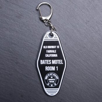 Bates Motel Movie Bag Tag. This bag tag is made with engraved acrylic. Comes with lobster clasp topper that easily hooks to a bag, zippers, keychains,