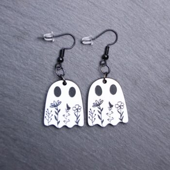 Floral Ghost Earrings that are white and black. These earrings are made with engraved acrylic. Comes with black hooks that is nickel free.