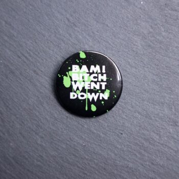 Bam Bitch Went Down Button. These buttons are made with photo paper, metal round, and metal backing. These buttons are vibrant and fun to use on bags or vests.