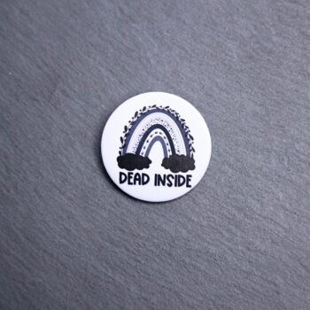 Dead Inside Button. These buttons are made with photo paper, metal round, and metal backing. These buttons are vibrant and fun to use on bags or vests.